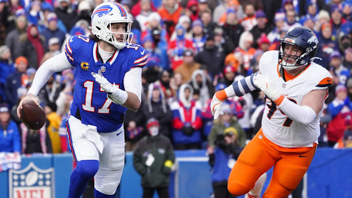 Jan 12, 2025; Orchard Park, New York, USA; Buffalo Bills quarterback Josh Allen (17) runs for a gain during the fourth quarter as Denver Broncos defensive end Zach Allen (99) defends in an AFC wild card game at Highmark Stadium. 