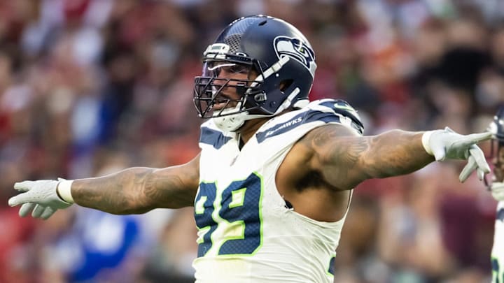 Dec 8, 2024; Glendale, Arizona, USA; Seattle Seahawks defensive end Leonard Williams (99) celebrates against the Arizona Cardinals at State Farm Stadium.