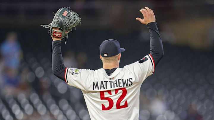 Sep 3, 2025; Minneapolis, Minnesota, USA; Minnesota Twins starting pitcher Zebby Matthews (52) reacts to Minnesota Twins left fielder Austin Martin (not pictured) catching a fly ball at the wall against the Chicago White Sox in the fifth inning at Target Field. Mandatory Credit: Jesse Johnson-Imagn Images Sep 3, 2025; Minneapolis, Minnesota, USA; Minnesota Twins starting pitcher Zebby Matthews (52) reacts to Minnesota Twins left fielder Austin Martin (not pictured) catching a fly ball at the wall against the Chicago White Sox in the fifth inning at Target Field. Mandatory Credit: Jesse Johnson-Imagn Images