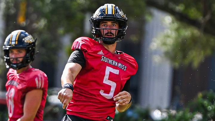 Southern Miss QB Ethan Hampton (#5) throws a pass during Week 2 of fall camp in Hattiesburg. Southern Miss QB Ethan Hampton (#5) throws a pass during Week 2 of fall camp in Hattiesburg.