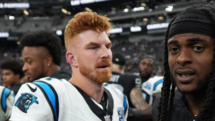 Sep 22, 2024; Paradise, Nevada, USA; Carolina Panthers quarterback Andy Dalton (14) shakes hands with Las Vegas Raiders wide receiver Davante Adams (17) after the game at Allegiant Stadium. Mandatory Credit: Kirby Lee-Imagn Images
