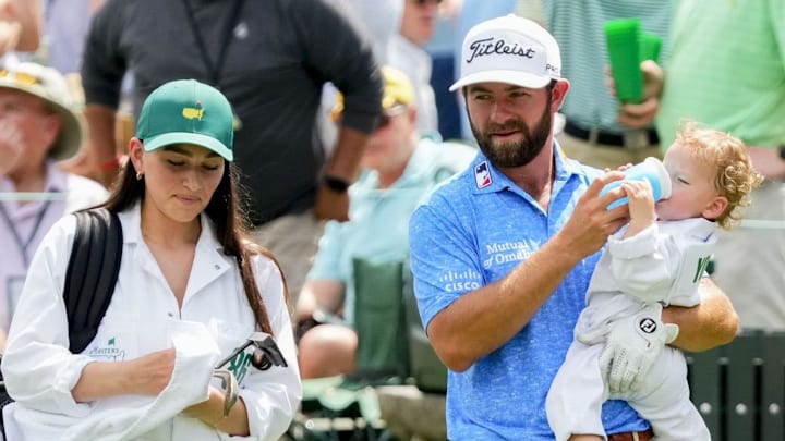 Kelsey Young caddies for her husband, Cameron Young