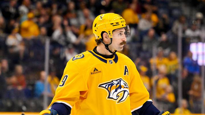 Oct 13, 2026; Nashville, Tennessee, USA;  Nashville Predators left wing Filip Forsberg (9) awaits the face off against the Vegas Golden Knights during the third period at Bridgestone Arena.  Mandatory Credit: Steve Roberts-Imagn Images
