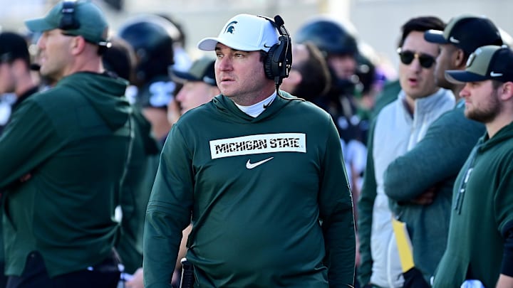 Nov 2, 2024; East Lansing, Michigan, USA;  Michigan State Spartans head coach Jonathan Smith looks over his sidelines during the first quarter against the Indiana Hoosiers at Spartan Stadium. Mandatory Credit: Dale Young-Imagn Images