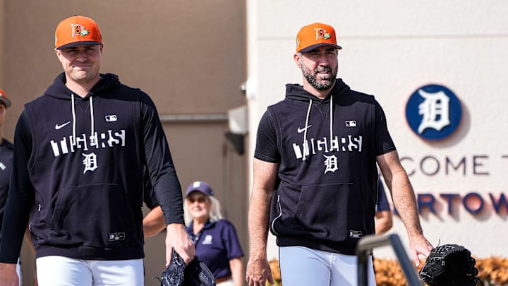 Detroit Tigers pitcher Tarik Skubal and Justin Verlander walk toward practice.