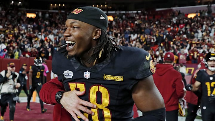 Oct 27, 2024; Landover, Maryland, USA; Washington Commanders linebacker Jordan Magee (58) celebrates after the Washington Commanders beat the Chicago Bears on a Hail Mary pass with no time left at Commanders Field. Mandatory Credit: Peter Casey-Imagn Images Oct 27, 2024; Landover, Maryland, USA; Washington Commanders linebacker Jordan Magee (58) celebrates after the Washington Commanders beat the Chicago Bears on a Hail Mary pass with no time left at Commanders Field. Mandatory Credit: Peter Casey-Imagn Images