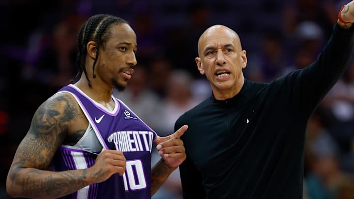 Mar 19, 2026; Sacramento, California, USA; Sacramento Kings guard DeMar DeRozan (10) is instructed by head coach Doug Christie during the fourth quarter against the Philadelphia 76ers at Golden 1 Center. Mar 19, 2026; Sacramento, California, USA; Sacramento Kings guard DeMar DeRozan (10) is instructed by head coach Doug Christie during the fourth quarter against the Philadelphia 76ers at Golden 1 Center.