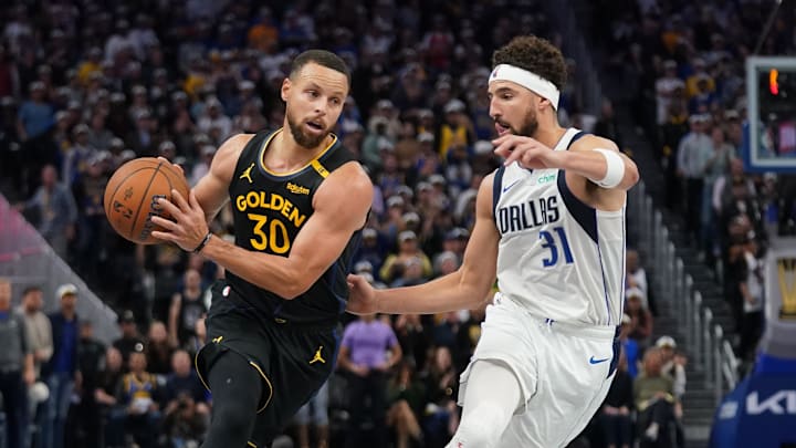 Nov 12, 2024; San Francisco, California, USA; Golden State Warriors guard Stephen Curry (30) drives past Dallas Mavericks guard Klay Thompson (31) in the fourth quarter at the Chase Center. Mandatory Credit: Cary Edmondson-Imagn Images Nov 12, 2024; San Francisco, California, USA; Golden State Warriors guard Stephen Curry (30) drives past Dallas Mavericks guard Klay Thompson (31) in the fourth quarter at the Chase Center. Mandatory Credit: Cary Edmondson-Imagn Images