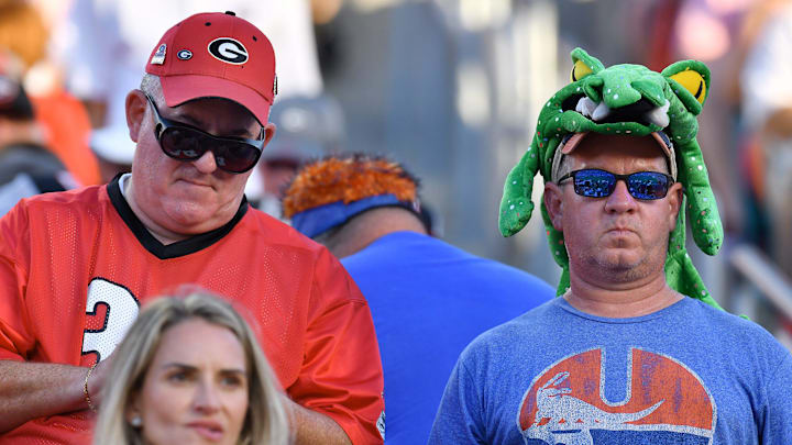 Georgia and Gator fans share space in the stands during second half action. The annual Florida vs Georgia football game at EverBank Stadium in Jacksonville, FL, Saturday, October 27, 2023. Georgia walked away with a final score of 43 to 20. [Bob Self/Florida Times-Union]