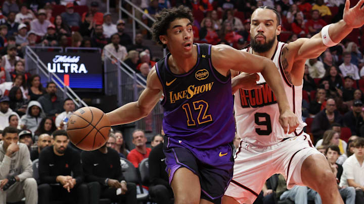 Jan 5, 2025; Houston, Texas, USA; Los Angeles Lakers guard Max Christie (12) looks to pass against Houston Rockets guard Max Christie (12) in the fourth quarter at Toyota Center. Mandatory Credit: Thomas Shea-Imagn Images Jan 5, 2025; Houston, Texas, USA; Los Angeles Lakers guard Max Christie (12) looks to pass against Houston Rockets guard Max Christie (12) in the fourth quarter at Toyota Center. Mandatory Credit: Thomas Shea-Imagn Images