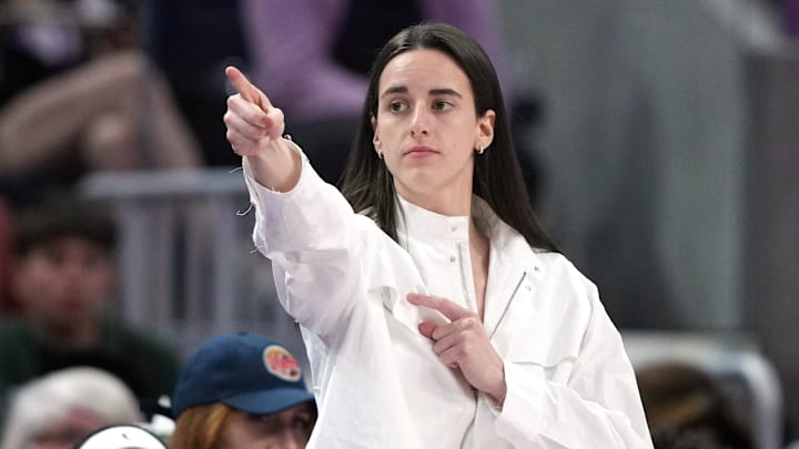 Aug 31, 2025; San Francisco, California, USA; Indiana Fever guard Caitlin Clark (center) gestures after an offensive foul by Golden State Valkyries guard Veronica Burton (foreground right) during the third quarter at Chase Center. Mandatory Credit: Darren Yamashita-Imagn Images Aug 31, 2025; San Francisco, California, USA; Indiana Fever guard Caitlin Clark (center) gestures after an offensive foul by Golden State Valkyries guard Veronica Burton (foreground right) during the third quarter at Chase Center. Mandatory Credit: Darren Yamashita-Imagn Images
