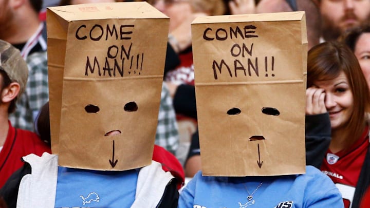 Detroit Lions fans wears bags on their heads in the fourth quarter against Arizona Cardinals in 2012