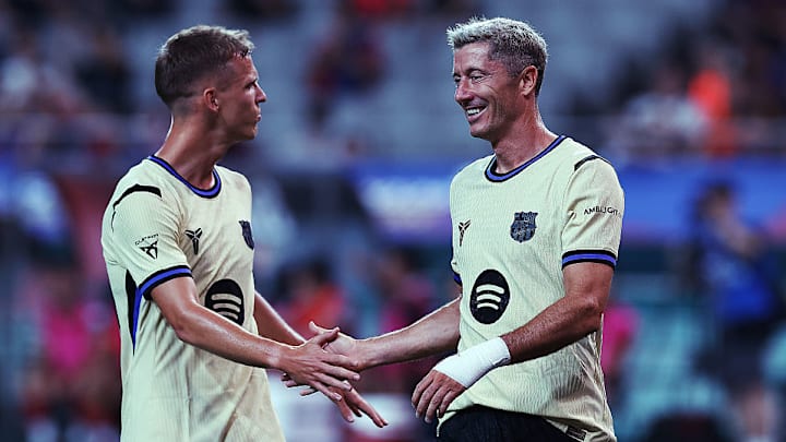 Dani Olmo (left) and Robert Lewandowski were regular starters a season ago.