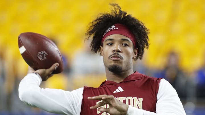 Nov 16, 2023; Pittsburgh, Pennsylvania, USA; Boston College Eagles quarterback Thomas Castellanos (1) warms up before the game against the Pittsburgh Panthers at Acrisure Stadium. Mandatory Credit: Charles LeClaire-Imagn Images