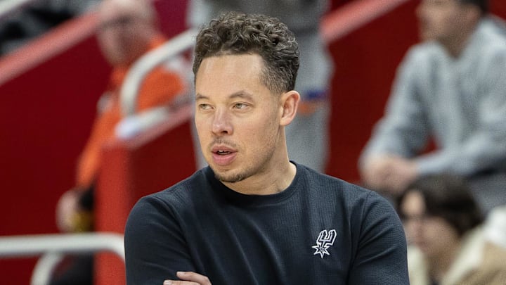 San Antonio Spurs interim coach Mitch Johnson watches the game.