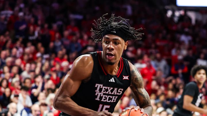 Feb 14, 2026; Tucson, Arizona, USA; Texas Tech Red Raiders forward JT Toppin (15) dribbles and dunks the ball during the first half of the game against the Arizona Wildcats at McKale Memorial Center. Mandatory Credit: Aryanna Frank-Imagn Images Feb 14, 2026; Tucson, Arizona, USA; Texas Tech Red Raiders forward JT Toppin (15) dribbles and dunks the ball during the first half of the game against the Arizona Wildcats at McKale Memorial Center. Mandatory Credit: Aryanna Frank-Imagn Images