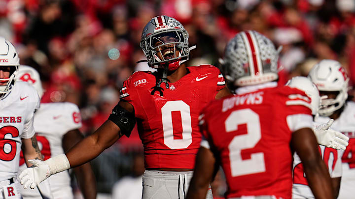 Ohio State Buckeyes linebacker Sonny Styles celebrates a sack by Caleb Downs against Rutgers. 