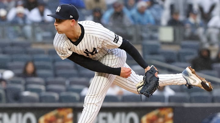Apr 12, 2025; Bronx, New York, USA; New York Yankees pitcher Luke Weaver (30) delivers a pitch against the San Francisco Giants during the seventh inning at Yankee Stadium.