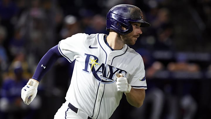 Sep 16, 2025; St. Petersburg, Florida, USA; Tampa Bay Rays second baseman Brandon Lowe (8) hits a RBI single ninth inning against the Toronto Blue Jays at George M. Steinbrenner Field. 