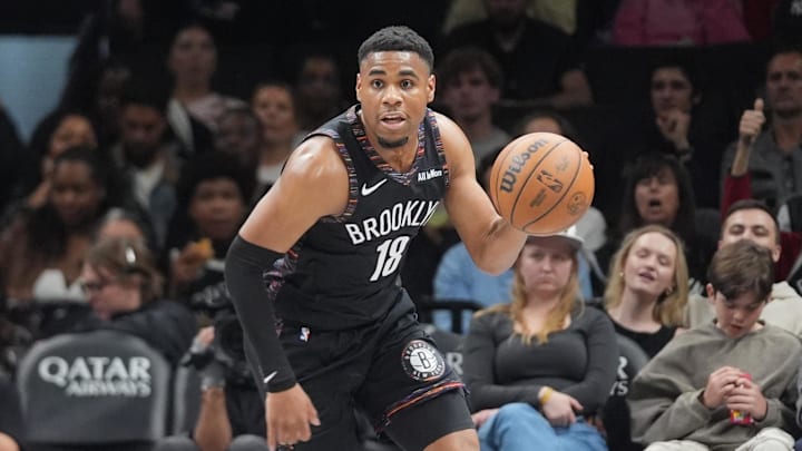 Apr 3, 2026; Brooklyn, New York, USA; Brooklyn Nets guard Malachi Smith (18) dribbles the ball up the court against the Atlanta Hawks during the first half at Barclays Center. Mandatory Credit: Gregory Fisher-Imagn Images