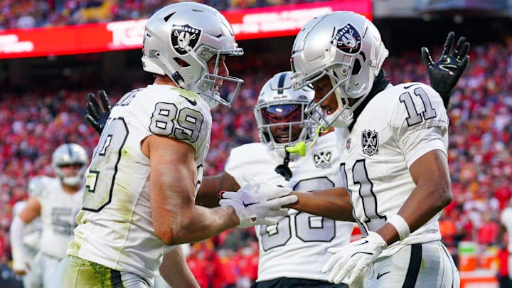 Nov 29, 2024; Kansas City, Missouri, USA; Las Vegas Raiders tight end Brock Bowers (89) celebrates with wide receiver Tre Tucker (11) after scoring against the Kansas City Chiefs during the second half at GEHA Field at Arrowhead Stadium. Mandatory Credit: Denny Medley-Imagn Images