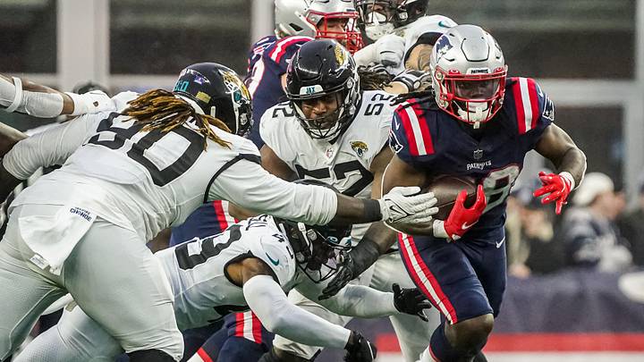 Jan 2, 2022; Foxborough, Massachusetts, USA; New England Patriots running back Rhamondre Stevenson (38) runs the ball against the Jacksonville Jaguars in the second half at Gillette Stadium. Mandatory Credit: David Butler II-Imagn Images
