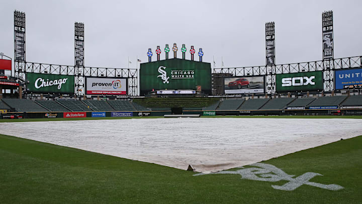 May 20, 2018; Chicago, IL, USA; A general shot of the tarp in the rain prior to a game between the Chicago White Sox and the Texas Rangers at Guaranteed Rate Field. Mandatory Credit: Dennis Wierzbicki-Imagn Images