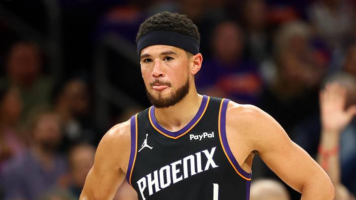 Apr 14, 2026; Phoenix, Arizona, USA; Phoenix Suns guard Devin Booker (1) reacts against the Portland Trail Blazers in the first half during the play-in rounds of the 2026 NBA Playoffs at Mortgage Matchup Center. Mandatory Credit: Mark J. Rebilas-Imagn Images Apr 14, 2026; Phoenix, Arizona, USA; Phoenix Suns guard Devin Booker (1) reacts against the Portland Trail Blazers in the first half during the play-in rounds of the 2026 NBA Playoffs at Mortgage Matchup Center. Mandatory Credit: Mark J. Rebilas-Imagn Images