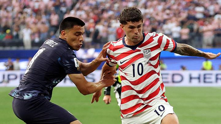  June 12, 2026; Inglewood, California, U.S.; Christian Pulisic of the U.S. in action with Paraguay's Diego Gomez.  Mandatory Credit: Kiyoshi Mio-Imagn Images 