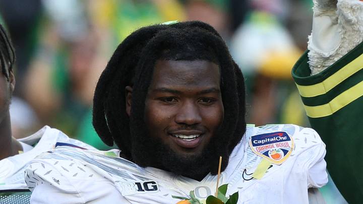 Jan 1, 2026; Miami Gardens, FL, USA; Oregon Ducks quarterback Dante Moore (5), wide receiver Malik Benson (4), defensive back Brandon Finney (4) and defensive lineman Bear Alexander (1) celebrate following the 2025 Orange Bowl and quarterfinal game of the College Football Playoff against the Texas Tech Red Raiders at Hard Rock Stadium. Mandatory Credit: Nathan Ray Seebeck-Imagn Images Jan 1, 2026; Miami Gardens, FL, USA; Oregon Ducks quarterback Dante Moore (5), wide receiver Malik Benson (4), defensive back Brandon Finney (4) and defensive lineman Bear Alexander (1) celebrate following the 2025 Orange Bowl and quarterfinal game of the College Football Playoff against the Texas Tech Red Raiders at Hard Rock Stadium. Mandatory Credit: Nathan Ray Seebeck-Imagn Images