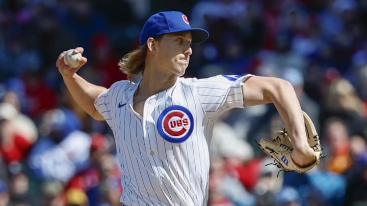 Apr 26, 2025; Chicago, Illinois, USA; Chicago Cubs starting pitcher Ben Brown (32) delivers a pitch against the Philadelphia Phillies during the first inning at Wrigley Field. 