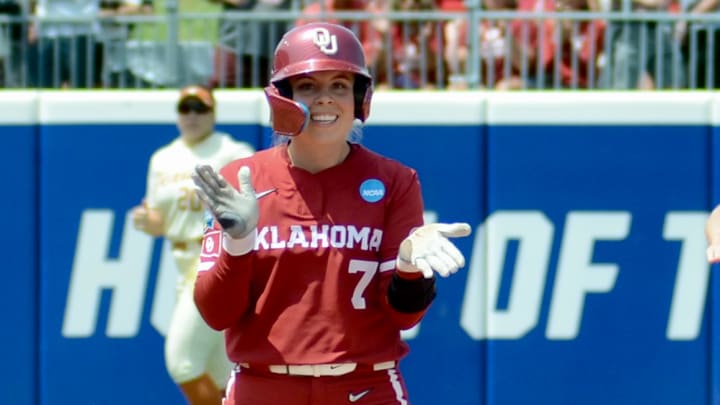 Oklahoma outfielder Kasidi Pickering celebrates after reaching base against Texas.