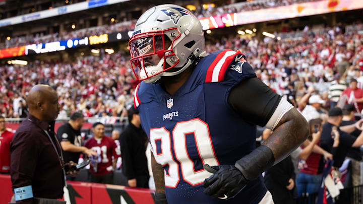 Dec 15, 2024; Glendale, Arizona, USA; New England Patriots defensive tackle Christian Barmore (90) against the Arizona Cardinals at State Farm Stadium. Mandatory Credit: Mark J. Rebilas-Imagn Images