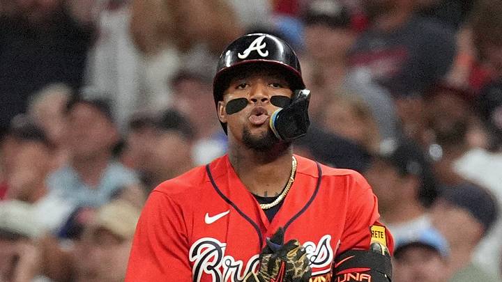 Oct 1, 2026; Cumberland, Georgia, USA;  Atlanta Braves outfielder Ronald Acuna Jr. (13) reacts after hitting a single against the Philadelphia Phillies during the third inning in game three of the Wildcard round for the 2026 MLB Playoffs at Truist Field.  Mandatory Credit: Dale Zanine-Imagn Images