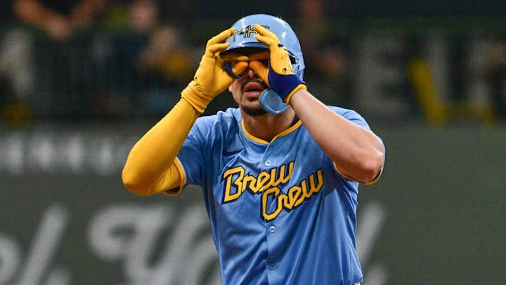 Sep 22, 2024; Milwaukee, Wisconsin, USA; Milwaukee Brewers shortstop Willy Adames (27) reacts after hitting a double to drive in a run in the seventh inning against the Arizona Diamondbacks at American Family Field.