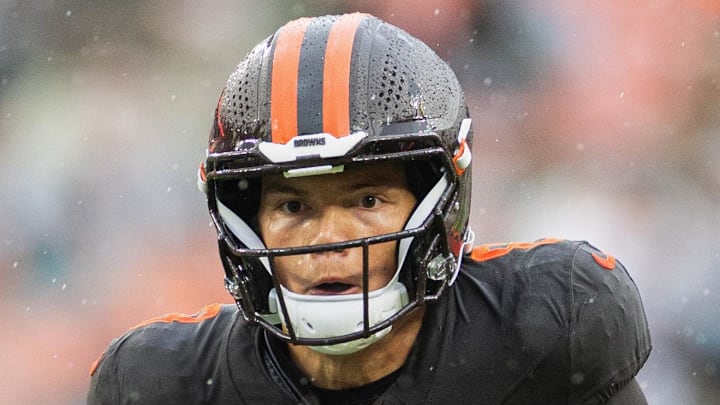 Cleveland Browns quarterback Dillon Gabriel runs with the ball against the Miami Dolphins.