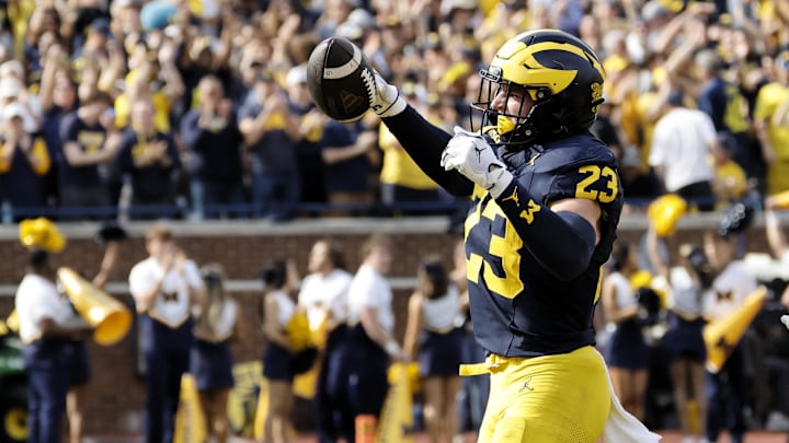 Oct 18, 2025; Ann Arbor, Michigan, USA;  Michigan Wolverines linebacker Cole Sullivan (23) celebrates after he makes an interception in the second half at Michigan Stadium. Mandatory Credit: Rick Osentoski-Imagn Images