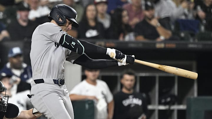 Aug 28, 2025; Chicago, Illinois, USA;  New York Yankees outfielder Cody Bellinger (35) doubles  against the Chicago White Sox during the fifth inning at Rate Field. Mandatory Credit: Matt Marton-Imagn Images