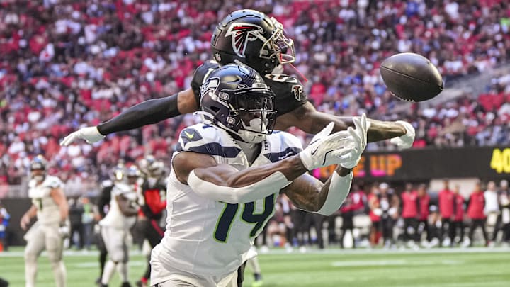 Oct 20, 2024; Atlanta, Georgia, USA; Seattle Seahawks wide receiver DK Metcalf (14) can not make a catch in the end zone defended by Atlanta Falcons cornerback A.J. Terrell (24) during the first quarter at Mercedes-Benz Stadium.