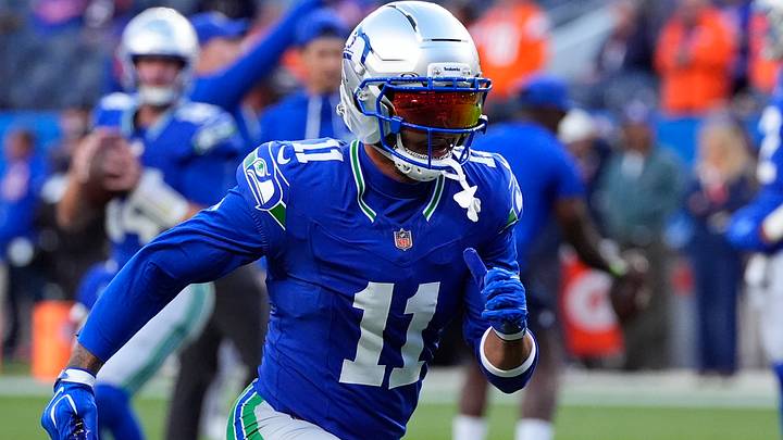 Seattle Seahawks wide receiver Jaxon Smith-Njigba warms up before the game against the Denver Broncos. Seattle Seahawks wide receiver Jaxon Smith-Njigba warms up before the game against the Denver Broncos.