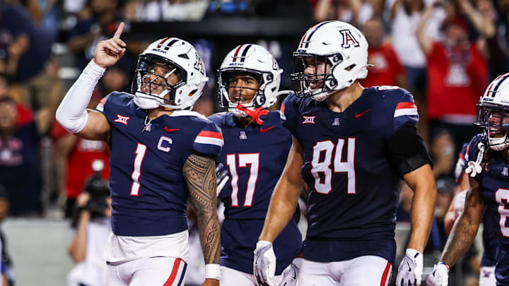 Aug 30, 2025; Tucson, Arizona, USA; Arizona Wildcats quarterback Noah Fifita (1) points up to the sky after scoring a touchdown during the third quarter of the game against the Hawaii Rainbow Warriors at Arizona Stadium. Mandatory Credit: Aryanna Frank-Imagn Images
