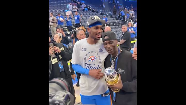 Shai Gilgeous-Alexander celebrates with his dad after reaching NBA Finals.