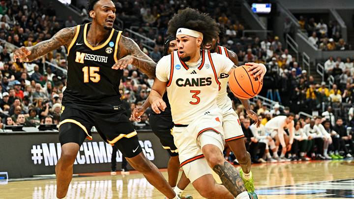 Mar 20, 2026; St. Louis, MO, USA; Miami (FL) Hurricanes guard Tre Donaldson (3) drives to the basket as Missouri Tigers center Shawn Phillips Jr. (15) defends during the second half during a first round game of the men's 2026 NCAA Tournament at Enterprise Center. Mandatory Credit: Jeff Le-Imagn Images Mar 20, 2026; St. Louis, MO, USA; Miami (FL) Hurricanes guard Tre Donaldson (3) drives to the basket as Missouri Tigers center Shawn Phillips Jr. (15) defends during the second half during a first round game of the men's 2026 NCAA Tournament at Enterprise Center. Mandatory Credit: Jeff Le-Imagn Images