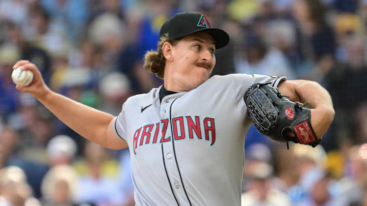Aug 28, 2025; Milwaukee, Wisconsin, USA; Arizona Diamondbacks relief pitcher Taylor Rashi (54) throws against the Milwaukee Brewers in his major league debut in the seventh inning at American Family Field. Mandatory Credit: Benny Sieu-Imagn Images Aug 28, 2025; Milwaukee, Wisconsin, USA; Arizona Diamondbacks relief pitcher Taylor Rashi (54) throws against the Milwaukee Brewers in his major league debut in the seventh inning at American Family Field. Mandatory Credit: Benny Sieu-Imagn Images