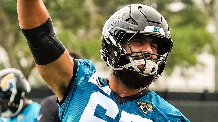 Jacksonville Jaguars guard Patrick Mekari (65) gets the fans excited during the second day of minicamp at the Miller Electric Center, Wednesday, June 10, 2026, in Jacksonville. 
