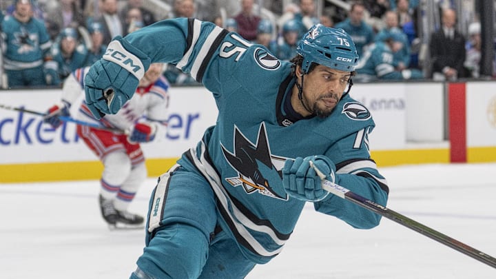 Jan 23, 2026; San Jose, California, USA;  San Jose Sharks right wing Ryan Reaves (75) chases after the puck during the third period against the New York Rangers at SAP Center at San Jose. Mandatory Credit: Stan Szeto-Imagn Images