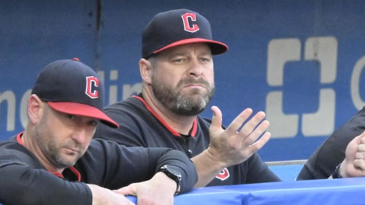 Jul 22, 2025; Cleveland, Ohio, USA; Cleveland Guardians associate manager Craig Albernaz (left), manager Stephen Vogt (center) and pitching coach Carl Willis (51) react after a foul ball entered the dugout in the third inning against the Baltimore Orioles at Progressive Field. Mandatory Credit: David Richard-Imagn Images