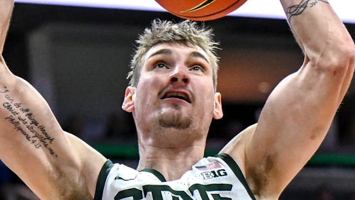 Michigan State's Carson Cooper dunks against Illinois during the second half on Saturday, Feb. 7, 2026, at the Breslin Center in East Lansing.
