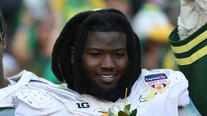 Oregon Ducks College Football Big Ten Dante Moore quarterback A'Mauri Washington Bear Alexander defensive lineman Dan Lanning