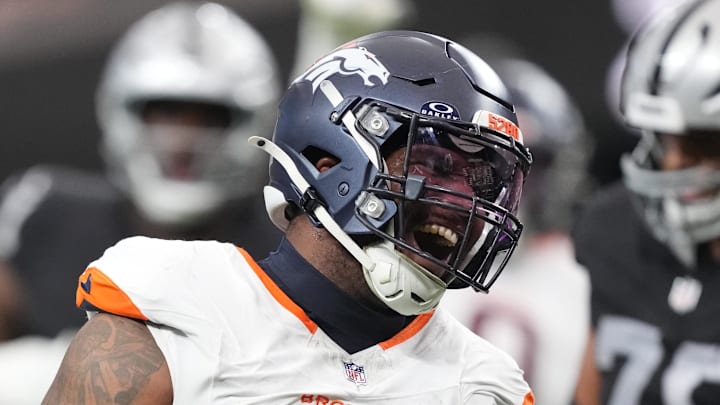 Dec 7, 2025; Paradise, Nevada, USA;  Denver Broncos defensive end John Franklin-Myers (98) reacts after a sack against the Las Vegas Raiders during the first half at Allegiant Stadium. Mandatory Credit: Kirby Lee-Imagn Images